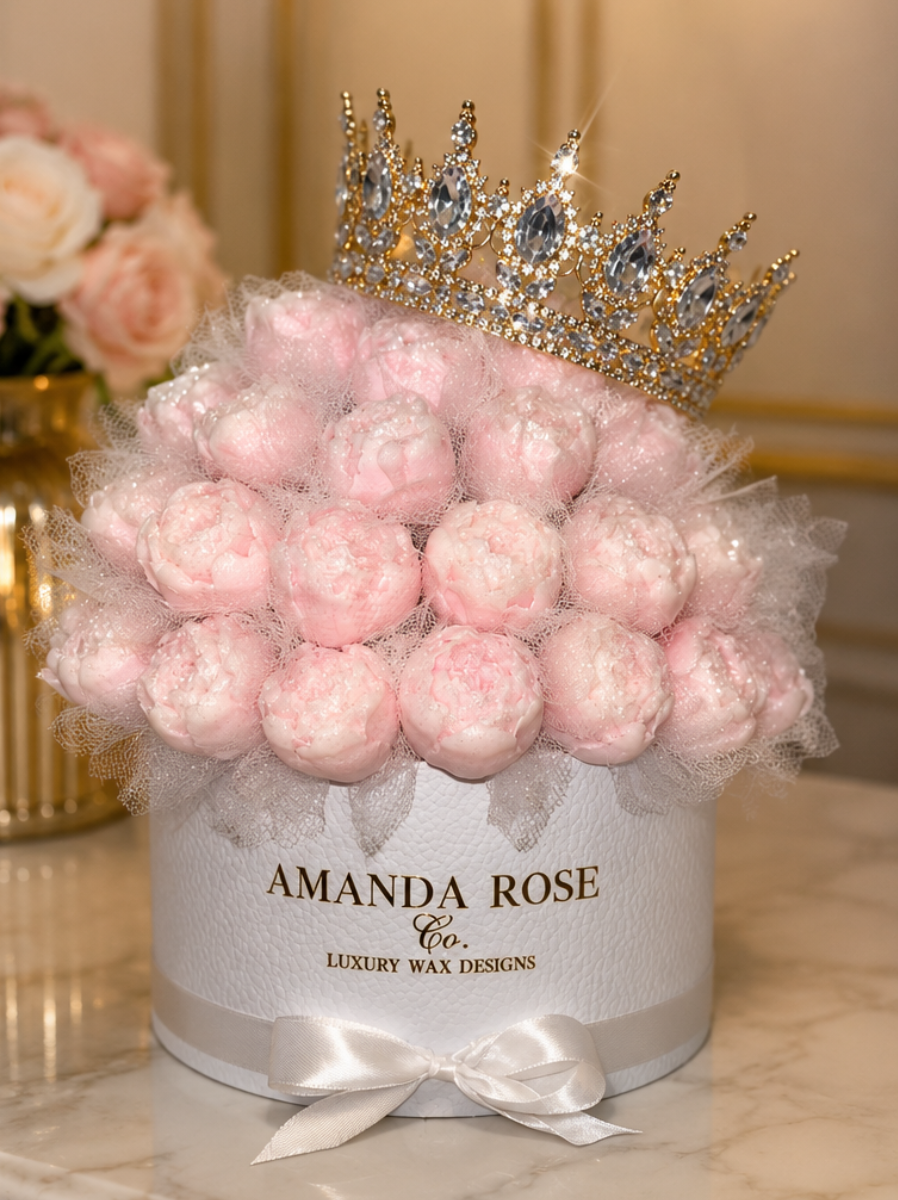 Pink wax melts in a container with a crown on top, branded 'Amanda Rose Co.'