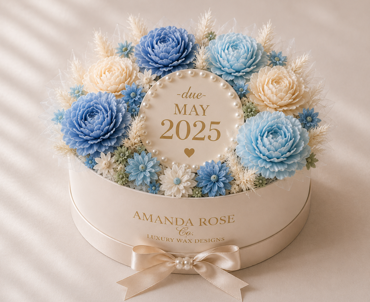 Floral arrangement in a box with 'due May 2025' and 'AMANDA ROSE' branding.